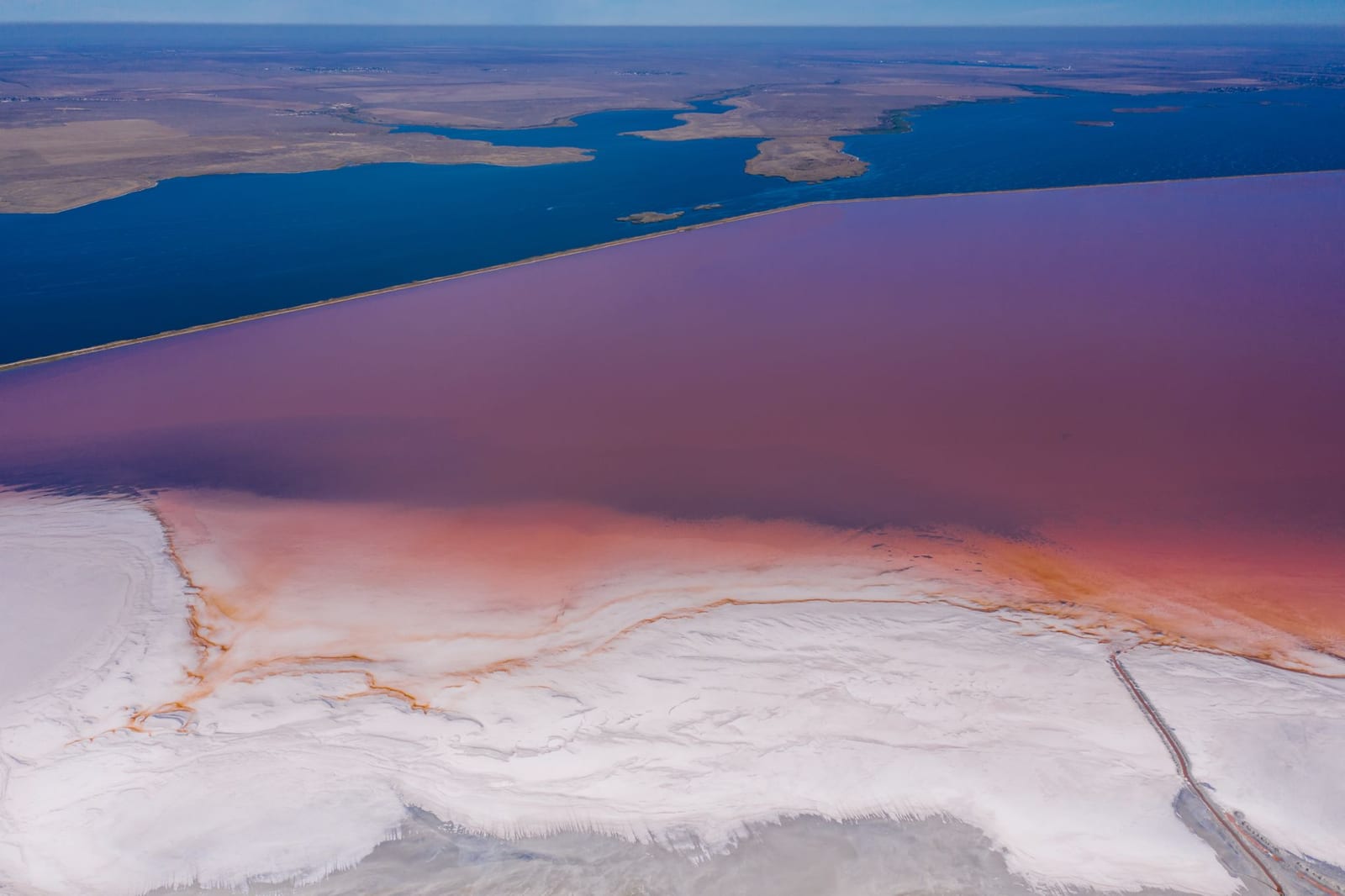 Aerial view of the pink lakes of Las Coloradas beside the sea